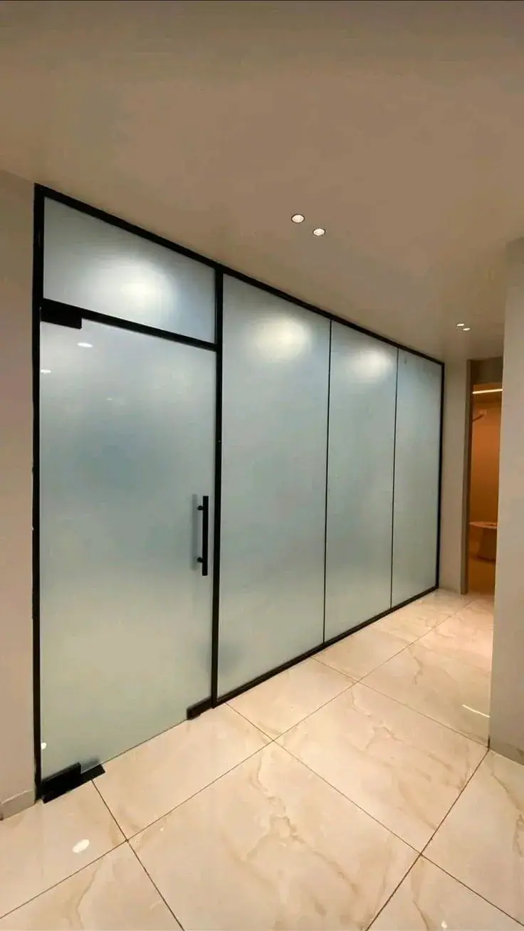 Soundproof glass partition in an office interior